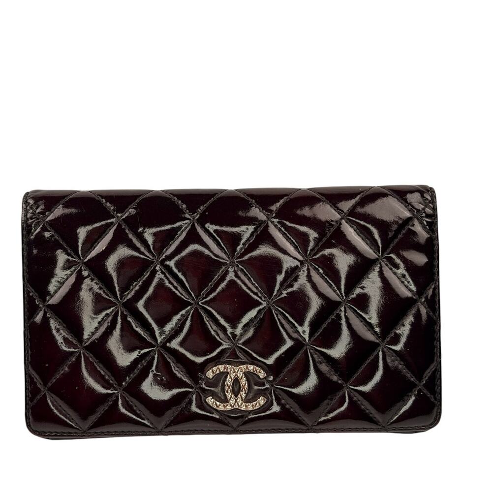 Chanel quilted patent leather long bifold wallet with a polished CC logo